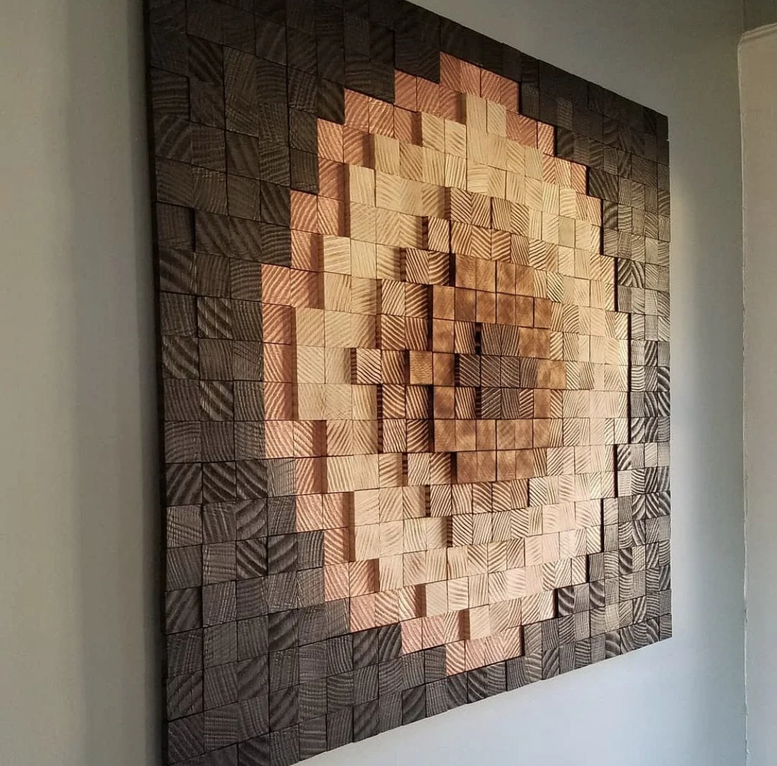 Reference: wooden pixel wall art made of small natural wood blocks at different depths, by Saajawat